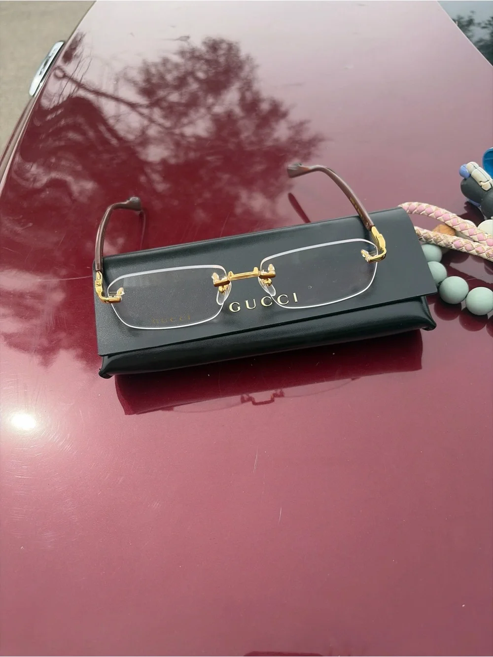 Gucci Rimless Sunglasses with Gold Hardware and Black Temples